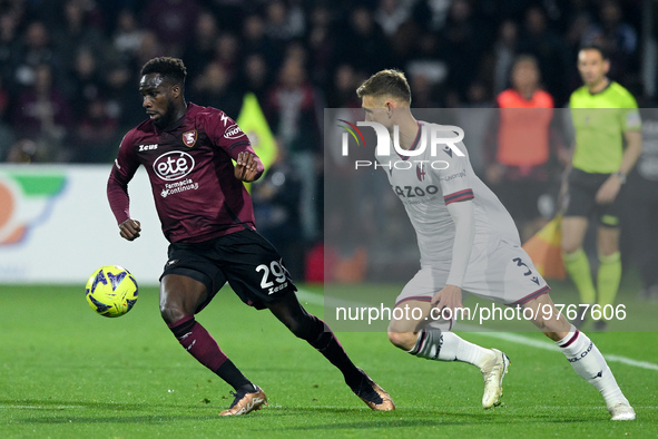 Boulaye Dia of US Salernitana and Stefan Posch of Bologna FC compete for the ball during the Serie A match between US Salernitana and Bologn...