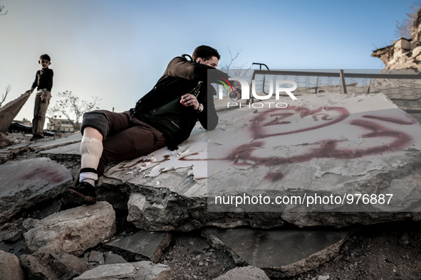 Love Heart painted on the ruins of buildings destroyed by Syrian government forces by Nour .Nour lost his leg following a bomb barrel attack...