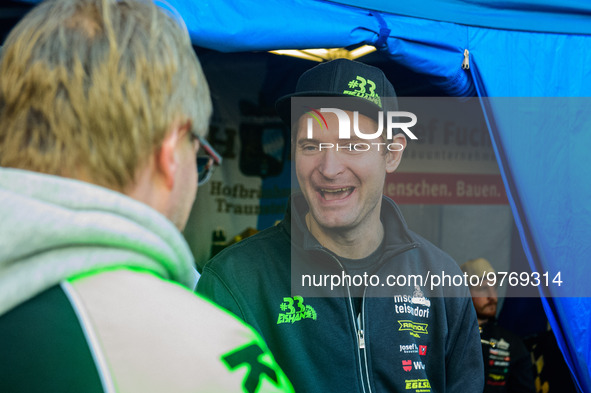 Johann Weber (16) chats with a fan during the Ice Speedway Gladiators World Championship Final 1 at Max-Aicher-Arena, Inzell, Germany on Sat...