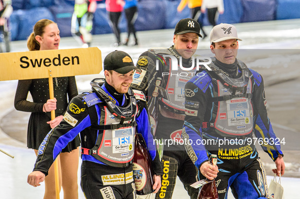 Swedish Riders on the parade lap (l-r), Martin Haarahiltunen (199), Jimmy Olsen (81) and Niclas Svensson (192) during the Ice Speedway Gladi...