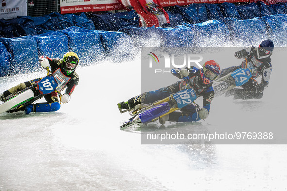 Niclas Svensson (192) (Red) leads Andrej Divis (107) (White) and Mats Jarf (74) (Blue) during the Ice Speedway Gladiators World Championship...