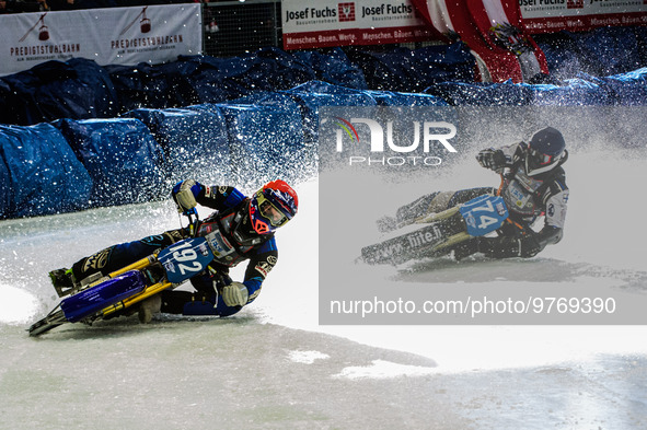 Niclas Svensson (192) (Red) leads Mats Jarf (74) (Blue) during the Ice Speedway Gladiators World Championship Final 1 at Max-Aicher-Arena, I...