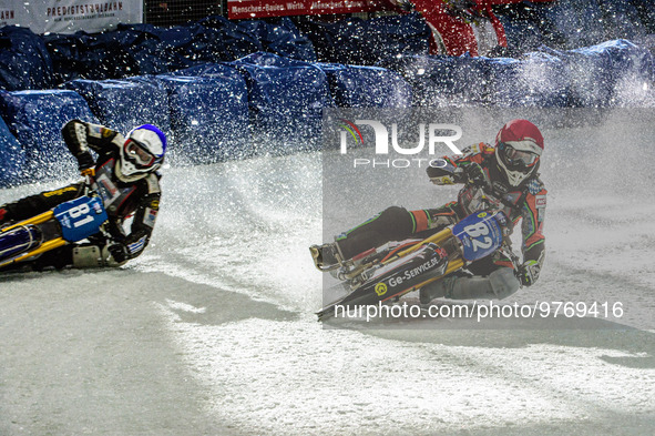 Markus Jell (82) (Red) inside Jimmy Olsen (81) (Blue) during the Ice Speedway Gladiators World Championship Final 1 at Max-Aicher-Arena, Inz...