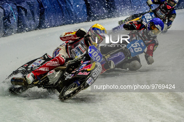 Franz Zorn (100) (Yellow) picks up outside Stefan Svensson (58) during the Ice Speedway Gladiators World Championship Final 1 at Max-Aicher-...