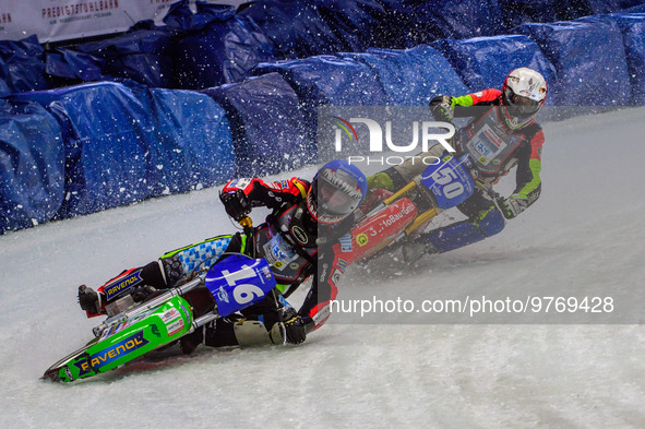 Johann Weber (16) (Blue) leads Harald Simon (50) (White) during the Ice Speedway Gladiators World Championship Final 1 at Max-Aicher-Arena,...