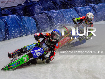 Johann Weber (16) (Blue) leads Harald Simon (50) (White) during the Ice Speedway Gladiators World Championship Final 1 at Max-Aicher-Arena,...