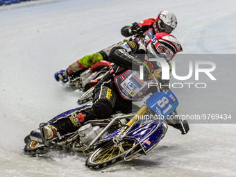 Jimmy Olsen (81) (Red) leads Harald Simon (50) (White) during the Ice Speedway Gladiators World Championship Final 1 at Max-Aicher-Arena, In...