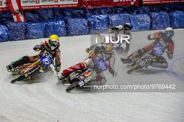 Franz Zorn (100) (Red) leads Markus Jell (82) (Yellow) Jo Saetre (357) (White) and Franz Mayerbuchler (93) (Blue) during the Ice Speedway Gl...