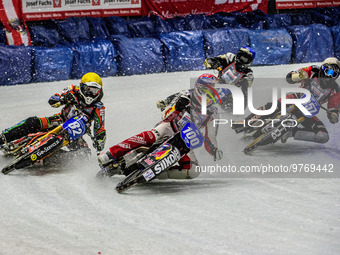 Franz Zorn (100) (Red) leads Markus Jell (82) (Yellow) Jo Saetre (357) (White) and Franz Mayerbuchler (93) (Blue) during the Ice Speedway Gl...