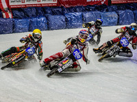 Franz Zorn (100) (Red) leads Markus Jell (82) (Yellow) Jo Saetre (357) (White) and Franz Mayerbuchler (93) (Blue) during the Ice Speedway Gl...