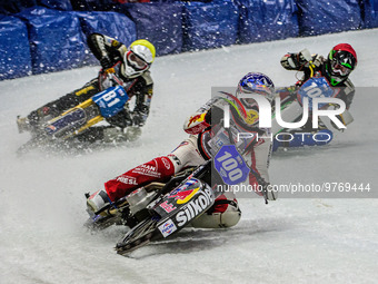 Franz Zorn (100) (Blue) leads Jimmy Olsen (81) (Yellow) and Andrej Divis (107) (Red) during the Ice Speedway Gladiators World Championship F...