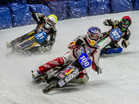 Franz Zorn (100) (Blue) leads Jimmy Olsen (81) (Yellow) and Andrej Divis (107) (Red) during the Ice Speedway Gladiators World Championship F...