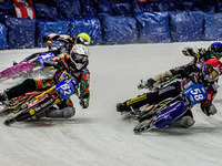 Stefan Svensson (58) (Red) inside Markus Jell (82) (White) with Harald Simon (50) (Blue) and Lukas Hutla (212) behind during the Ice Speedwa...