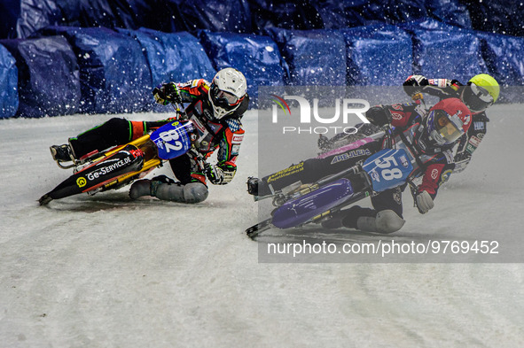 Stefan Svensson (58) (Red) inside Markus Jell (82) (White) with Lukas Hutla (212) behind during the Ice Speedway Gladiators World Championsh...