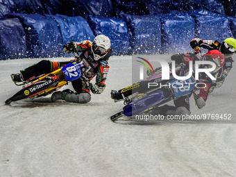 Stefan Svensson (58) (Red) inside Markus Jell (82) (White) with Lukas Hutla (212) behind during the Ice Speedway Gladiators World Championsh...