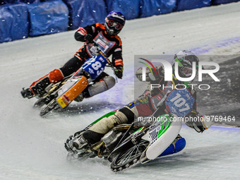 Andrej Divis (107) (White) leads Sebastian Reitsma (283) (Blue) during the Ice Speedway Gladiators World Championship Final 1 at Max-Aicher-...