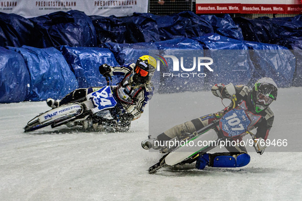 Andrej Divis (107) (White) inside Max Koivula (24) (Yellow) during the Ice Speedway Gladiators World Championship Final 1 at Max-Aicher-Aren...