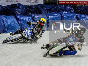 Andrej Divis (107) (White) inside Max Koivula (24) (Yellow) during the Ice Speedway Gladiators World Championship Final 1 at Max-Aicher-Aren...