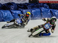 Andrej Divis (107) (White) inside Max Koivula (24) (Yellow) during the Ice Speedway Gladiators World Championship Final 1 at Max-Aicher-Aren...