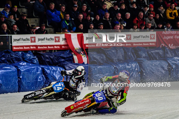 Harald Simon (50) (Blue) inside Mats Jarf (74) (White) during the Ice Speedway Gladiators World Championship Final 1 at Max-Aicher-Arena, In...