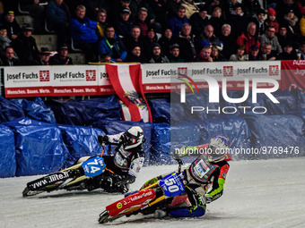 Harald Simon (50) (Blue) inside Mats Jarf (74) (White) during the Ice Speedway Gladiators World Championship Final 1 at Max-Aicher-Arena, In...