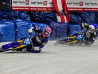 Niclas Svensson (192) (Red) leads Jimmy Olsen (81) (White) during the Ice Speedway Gladiators World Championship Final 1 at Max-Aicher-Arena...