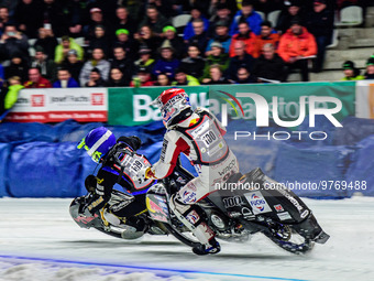 Martin Haarahiltunen (199) (Blue) shuts down Franz Zorn (100) (Red) during the Ice Speedway Gladiators World Championship Final 1 at Max-Aic...