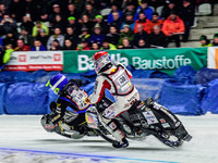 Martin Haarahiltunen (199) (Blue) shuts down Franz Zorn (100) (Red) during the Ice Speedway Gladiators World Championship Final 1 at Max-Aic...