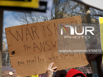 Demonstrators march in Washington, D.C. on March 18, 2023 during an anti-war protest organized by the Answer Coalition and dozens of other g...