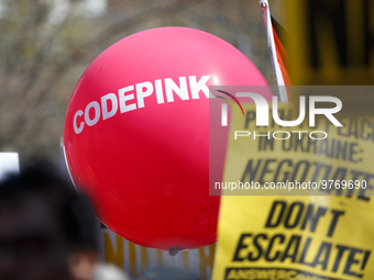 A balloon bearing the name of the activist group CodePink floats during an anti-war protest in Washington, D.C. on March 18, 2023. The prote...