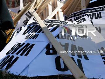 Protest signs lay on the ground during an anti-war protest in Washington, D.C. on March 18, 2023. The protest, organized by the Answer Coali...