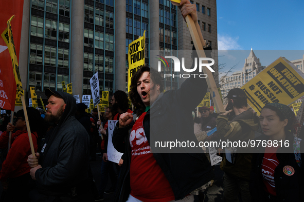 Demonstrators march in Washington, D.C. on March 18, 2023 during an anti-war protest organized by the Answer Coalition and dozens of other g...