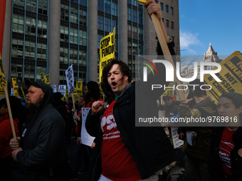 Demonstrators march in Washington, D.C. on March 18, 2023 during an anti-war protest organized by the Answer Coalition and dozens of other g...