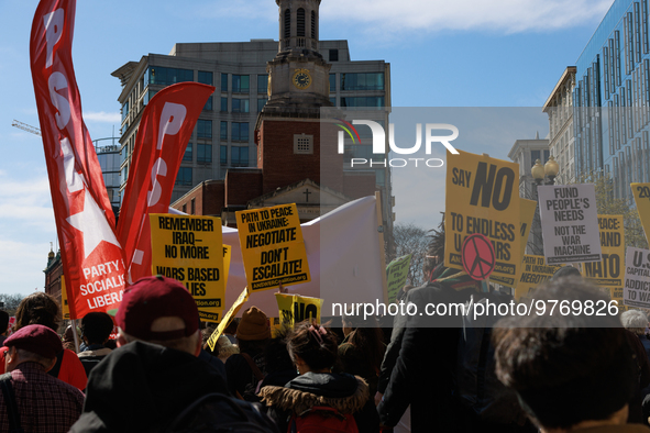 Demonstrators march in Washington, D.C. on March 18, 2023 during an anti-war protest organized by the Answer Coalition and dozens of other g...