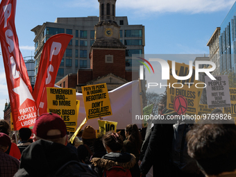 Demonstrators march in Washington, D.C. on March 18, 2023 during an anti-war protest organized by the Answer Coalition and dozens of other g...