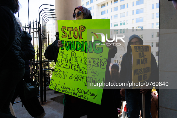 Demonstrators walk into The New York Avenue Presbyterian Church to listen to people speak during an anti-war protest in Washington, D.C. on...