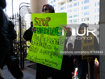 Demonstrators walk into The New York Avenue Presbyterian Church to listen to people speak during an anti-war protest in Washington, D.C. on...