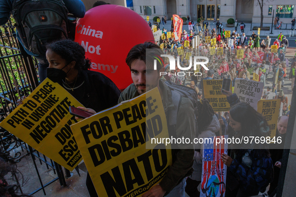 Demonstrators walk into The New York Avenue Presbyterian Church to listen to people speak during an anti-war protest in Washington, D.C. on...