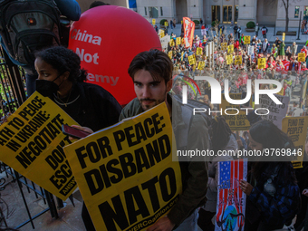 Demonstrators walk into The New York Avenue Presbyterian Church to listen to people speak during an anti-war protest in Washington, D.C. on...