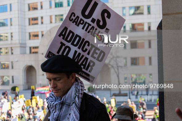 Demonstrators walk into The New York Avenue Presbyterian Church to listen to people speak during an anti-war protest in Washington, D.C. on...