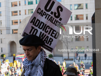 Demonstrators walk into The New York Avenue Presbyterian Church to listen to people speak during an anti-war protest in Washington, D.C. on...