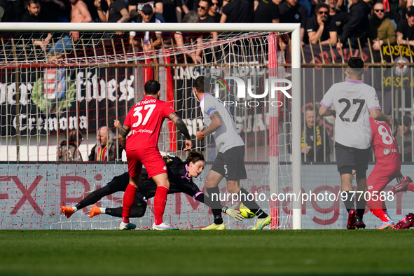 Marco Carnesecchi (#12 Cremonese) stop shot of Carlos Augusto (#30 AC Monza) during AC Monza against US Cremonese, Serie A, at U-Power Stadi...