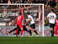 Marco Carnesecchi (#12 Cremonese) stop shot of Carlos Augusto (#30 AC Monza) during AC Monza against US Cremonese, Serie A, at U-Power Stadi...