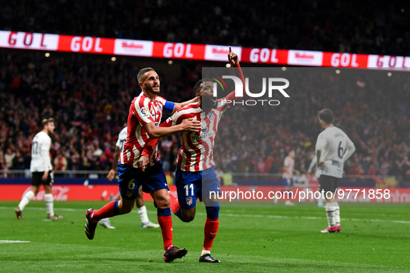 Thomas Lemar and Koke celebrates a goal during La Liga match between Atletico de Madrid and Valencia CF at Civitas Metropolitano on March 18...