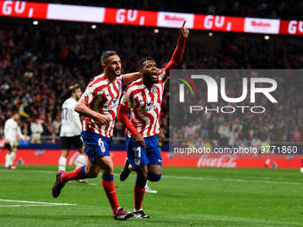 Thomas Lemar and Koke celebrates a goal during La Liga match between Atletico de Madrid and Valencia CF at Civitas Metropolitano on March 18...