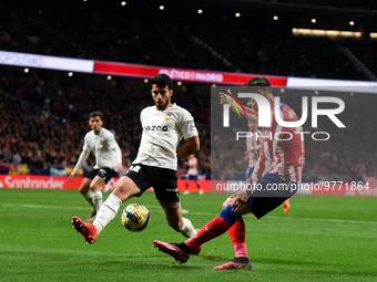 Alvaro Morata and Eray Comert during La Liga match between Atletico de Madrid and Valencia CF at Civitas Metropolitano on March 18, 2023 in...