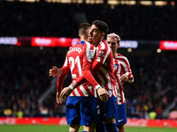 Yannick Carrasco and Josema Gimenez celebrates a goal during La Liga match between Atletico de Madrid and Valencia CF at Civitas Metropolita...