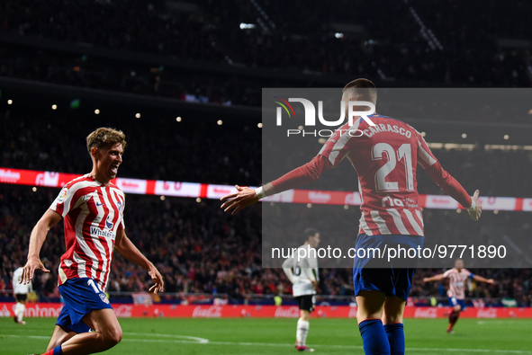 Yannick Carrasco and Marcos Llorente celebrates a goal during La Liga match between Atletico de Madrid and Valencia CF at Civitas Metropolit...