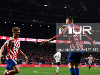 Yannick Carrasco and Marcos Llorente celebrates a goal during La Liga match between Atletico de Madrid and Valencia CF at Civitas Metropolit...