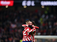 Yannick Carrasco and Rodrigo de Paul celebrates a goal during La Liga match between Atletico de Madrid and Valencia CF at Civitas Metropolit...